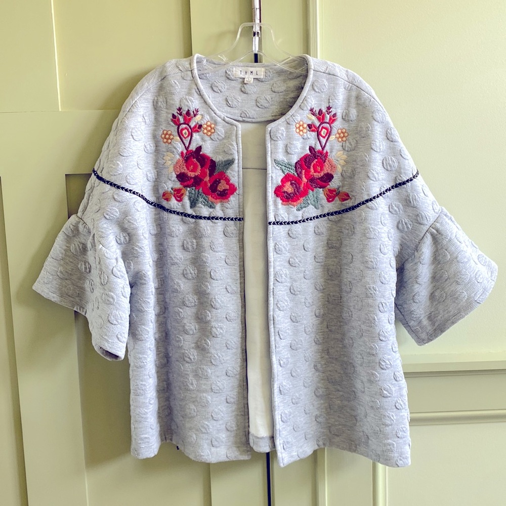 THML “jacket” size large. Grey with floral embroidery on chest. Open front.